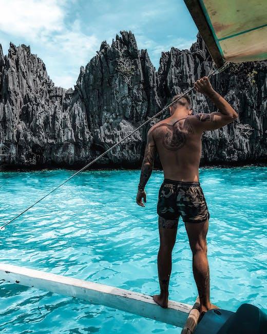 Photo Of A Man Standing On A Boat