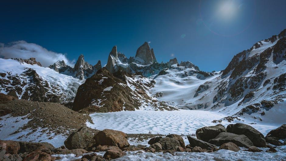 Snow Covered Mountain Under Blue Sky